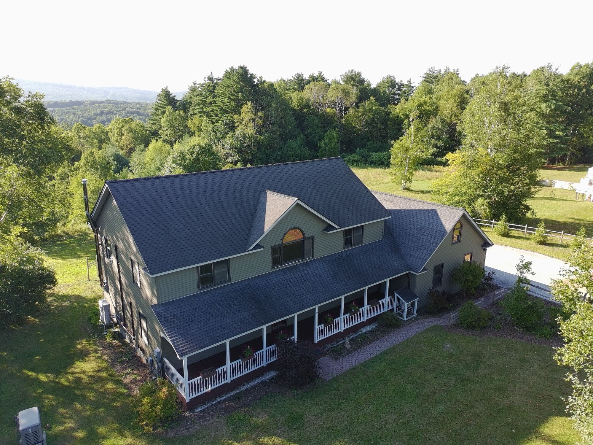 Elevated drone view of a Rutland County home and its lot